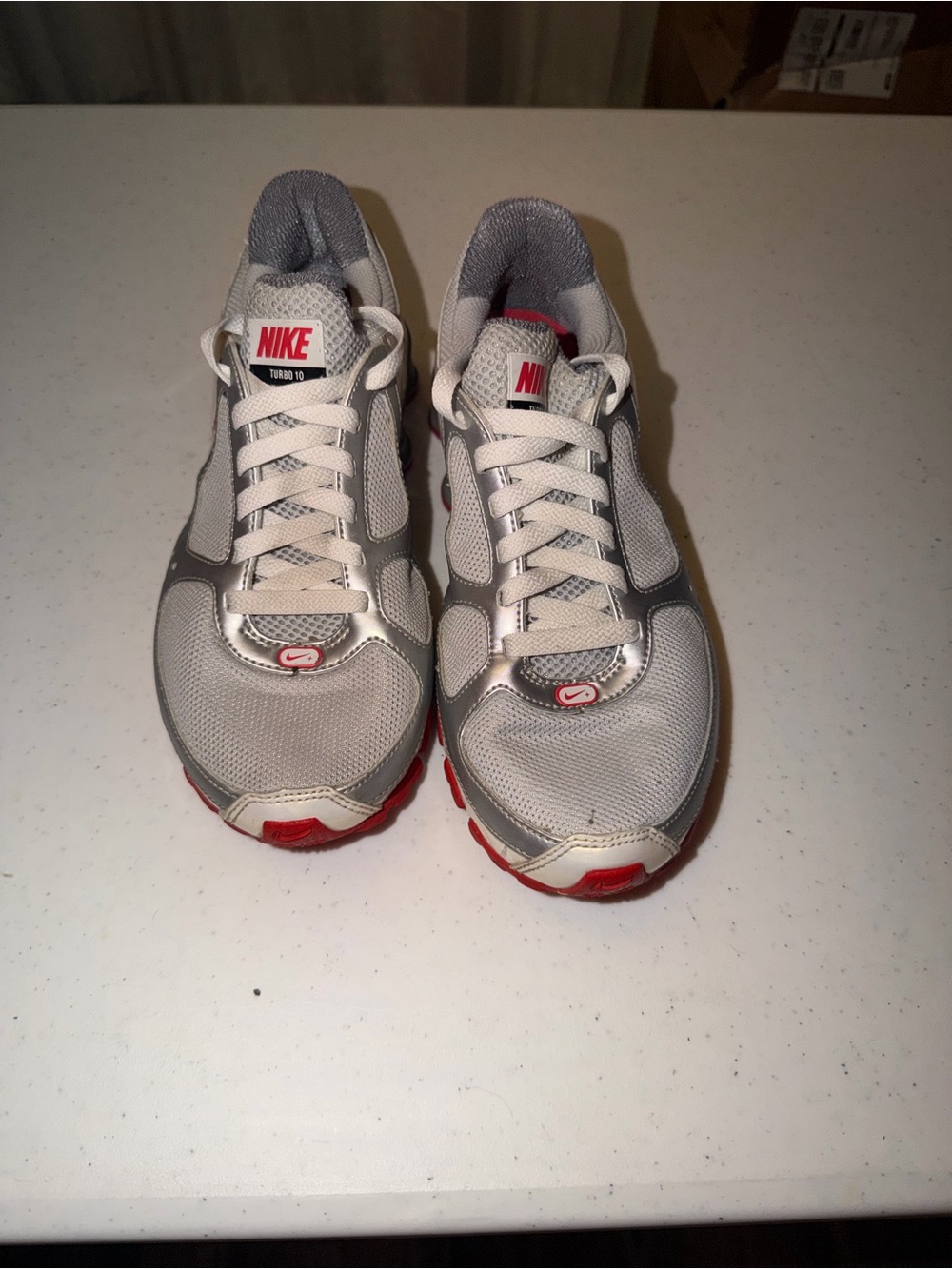 Nike Women’s Gray and Red Running Sneakers